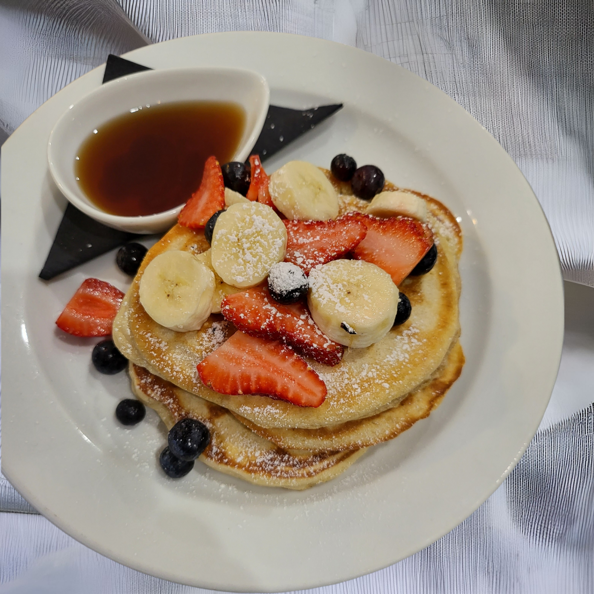 Pancakes with fresh fruit at Cattle Dog Cafe Muswellbrook